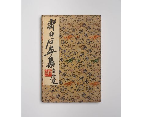 AN ALBUM OF CHINESE WOODBLOCK PRINTS 2OTH CENTURY Containing twenty-two prints of works by Qi Baishi, depicting various flowe