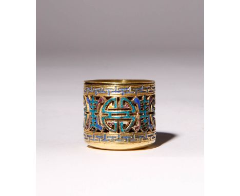 A CHINESE CHAMPLEVE ENAMEL ARCHER'S RING QING DYNASTY Decorated with pierced shou characters between geometric borders, on a 