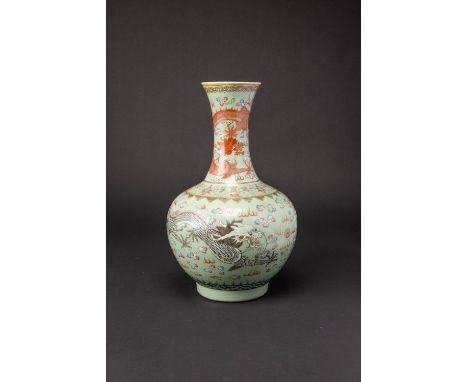 A CHINESE CELADON FAMILLE ROSE 'DRAGON AND PHOENIX' BOTTLE VASE LATE QING DYNASTY The lower section decorated with a scaly wh