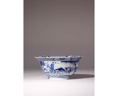 A CHINESE BLUE AND WHITE 'FIGURAL' BOWL KANGXI 1662-1722 The exterior painted with two panels containing figures in an interi