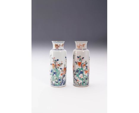 A PAIR OF CHINESE CYLINDRICAL VERTE IMARI VASES KANGXI 1662-1722 Each painted with leafy prunus and peony branches growing fr