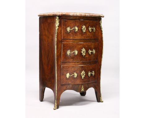 A LOUIS XV SERPENTINE-FRONTED KINGWOOD PETIT COMMODE with marble top, three drawers with brass handles and escutcheons. Stamp
