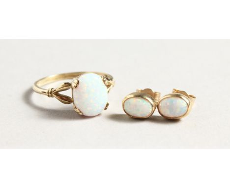 A 9CT GOLD OPAL SET RING AND EARRINGS