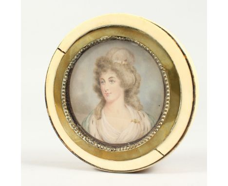 A GEORGIAN IVORY CIRCULAR BOX, the top painted with a portrait of Lady Mary Onslow. 3.75ins diameter.