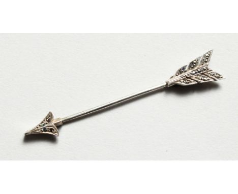 AN ARROW BROOCH PIN.