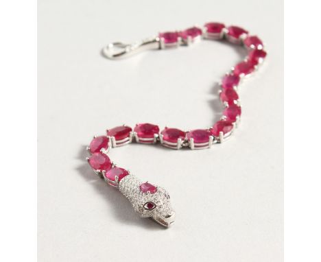 A SILVER RUBY SET SNAKE BRACELET.