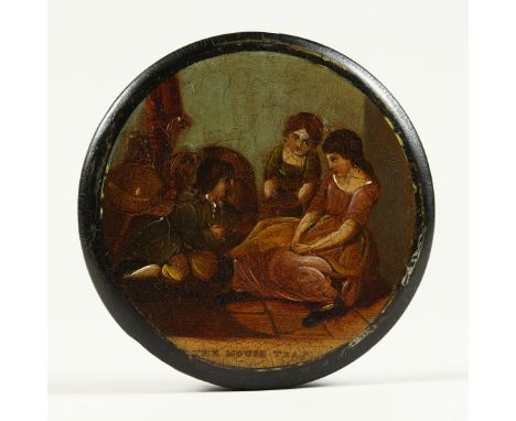 A VICTORIAN CIRCULAR PAPIER MACHE SNUFF BOX, the top with a scene "The Mouse Trap". 3.5ins diameter.