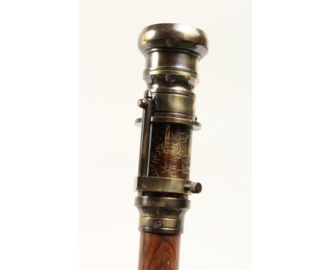 A WALKING STICK with compass and telescope