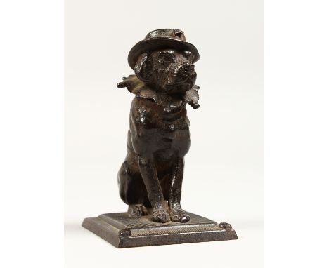 A GOOD SMALL BRONZE DOG INKWELL on a square base. 4ins high.