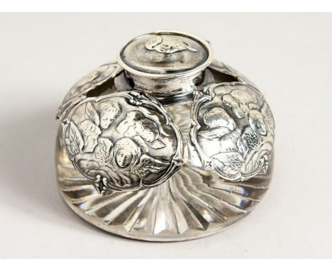 A SILVER MOUNTED CIRCULAR INKWELL with five cherubs design London 1905