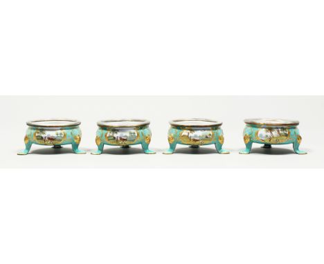 A VERY RARE SET OF FOUR BATTERSEA ENAMEL CIRCULAR  SALTS, turquoise-colour ground, painted with vignettes of Arabian scenes, 