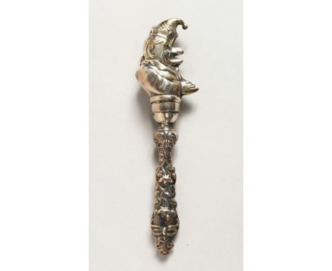 A STERLING SILVER PUNCH BABIES' RATTLE.