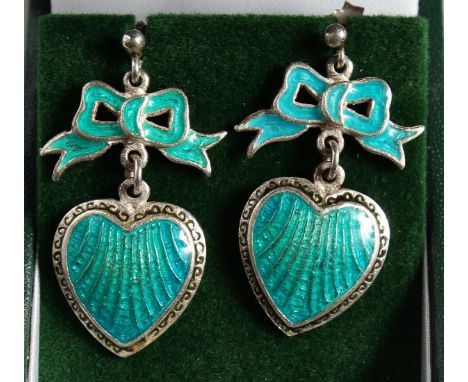 A PAIR OF SILVER AND ENAMEL BOW AND HEART EARRINGS