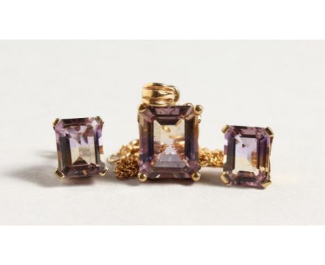 A 9CT TWO-COLOUR AMETHYST NECKLACE AND EARRINGS SET.