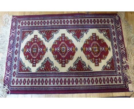 Red ground Persian style carpet, 124 x 89cm. Unfortunately we are unable to do condition reports and extra images for our Int