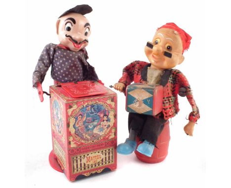 Two wind-up / turn handle organ grinder toys, one by Matell, largest measures 30cm high. Unfortunately we are unable to do co