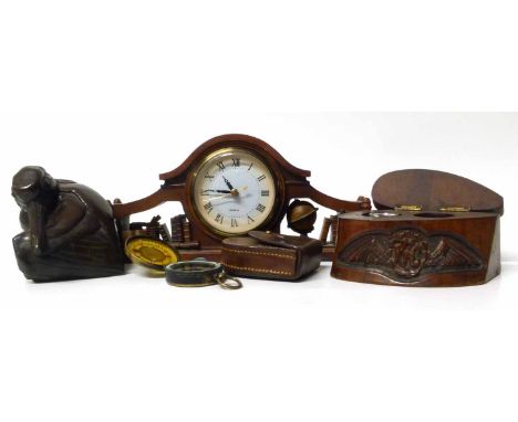 A hardwood pelican carving, a wood carved Royal flying corps inkwell , a brass compass in leather case and a Quartz "book" cl