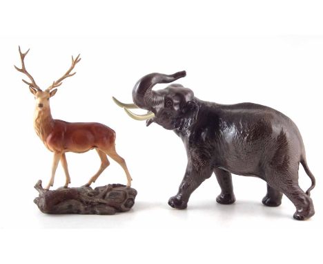 Beswick Elephant with trunk in salute, also a Stag in matt (2)     Condition report: No damage or restoration to the stag. Th