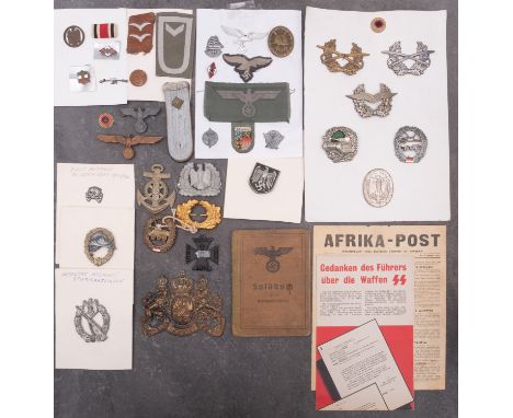 A collection of German Army badges and insignia, (some reproductions).