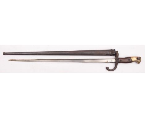 A French 1874 pattern Gras sword bayonet, the single edge 'T' section blade over a steel hook quillon' with two piece wooden 