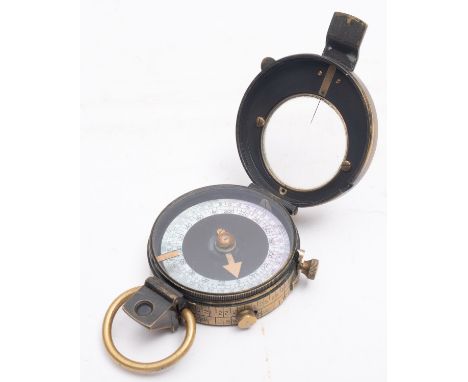 A WWI period brass Vernier Compass, maker Anglo -Swiss Association, stamped as per title and dated 1915, in a brown leather c