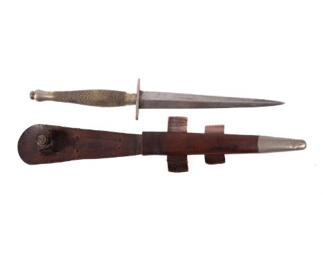 A WWII Fairbairn Sykes Fighting Knife, Second pattern, the straight double edge blade over an oval hilt engraved to edge 'Ian