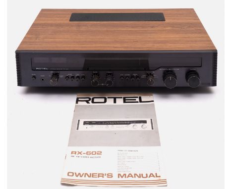  A Rotel RX-602 AM/FM Stereo receiver, together with instruction manual.