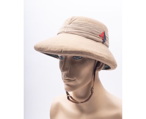 An Australian Commonwealth Forces slouch hat, together with a post-war 7th Ghurka Regiment  hat and an Indian Army topee (3) 