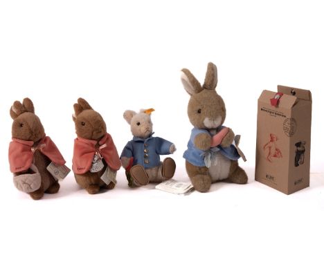 A Steiff plush Peter Rabbit, 20cm high, together with an Eden Peter Rabbit 30cm high and an August du Bay, Mopsy and Cottonta