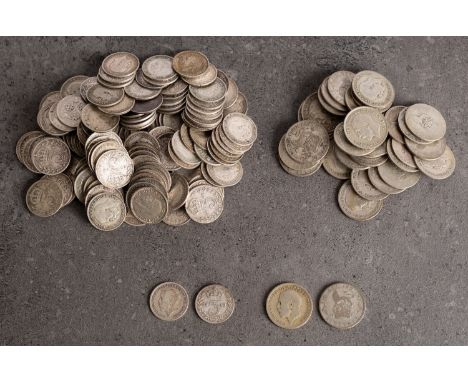 A quantity of silver George V sixpences and threepences.