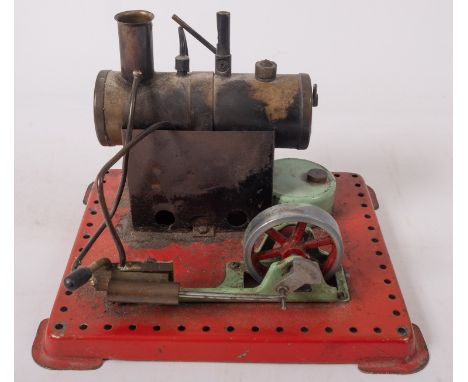 Manmod or similar. An unboxed live steam stationary engine on a platform base, 21cm wide,