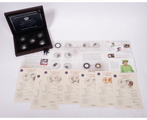 Silver fifty pence set, boxed, Isle of Man, 2018, together with 70 years Our Queen set containing one 2.75g 9CT gold coin (2)