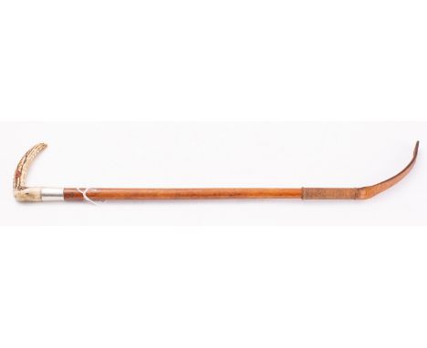A silver mounted antler handled riding crop, maker Swain & Adeney for Champion & Wilson, London. 1947, 65cm long 
