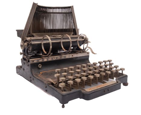 A late 19th Century 'The Waverley Type Writer', maker Higgins & Jenkins, with vertical type bars behind platen for visible wr