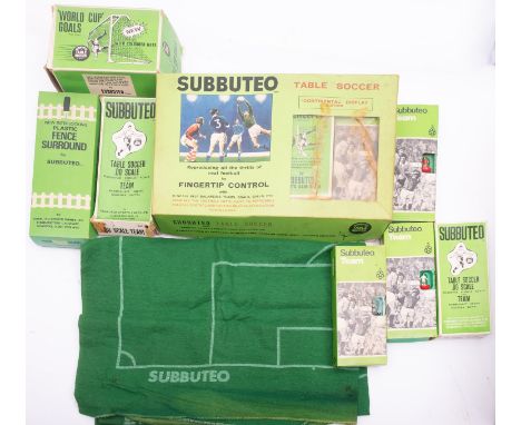 A collection of Subbuteo including 10 teams, trophies, box of fence,  pitch & accessories.