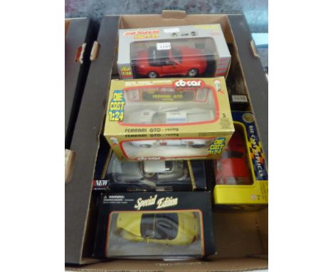 A COLLECTION OF EIGHT BOXED 1:24 SCALE MODEL DIECAST CARS, 7 x Porsche and 1 x Ferrari, various manufacturers including Burag