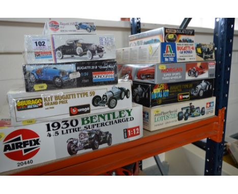 A QUANTITY OF BOXED UNBUILT METAL AND PLASTIC CAR MODEL CONSTRUCTION KITS, to include several Bugatti models, Tamiya 1/12 Joh