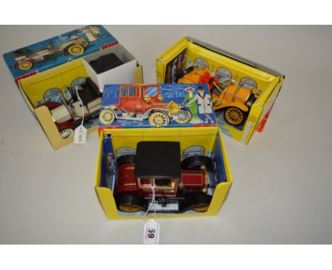 THREE BOXED SCHUCO 'OLD TIMER' TINPLATE CLOCKWORK CARS, Mercer Type 35J, No.1225, Ford Model T Coupe, No.1227, and Mercedes S