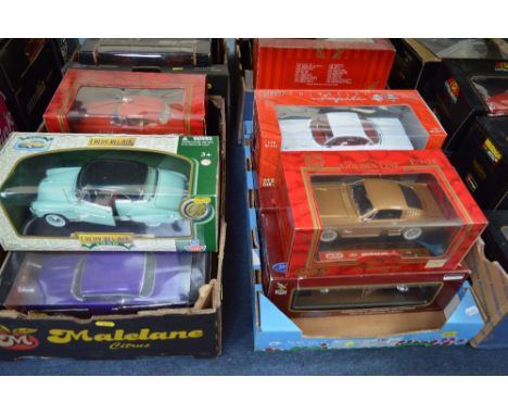 A COLLECTION OF TEN BOXED 1:18 SCALE MODEL DIECAST CARS, manufactured by Mira, Sunstar, Burago and Yat Ming. Models are Ameri