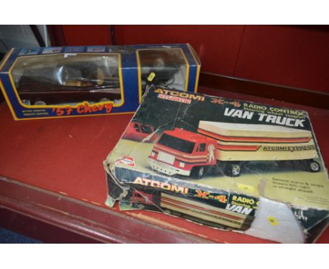 A BOXED TOY STATE REMOTE CONTROL PLASTIC '57 CHEVROLET, not tested, complete with controller, box damaged, with a boxed Ashai