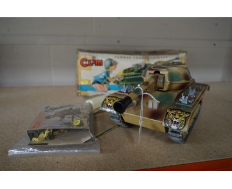 A BOXED CLIM METAL AND PLASTIC BATTERY OPERATED REMOTE CONTROL TANK, not tested, missing missiles and part of one missile hol