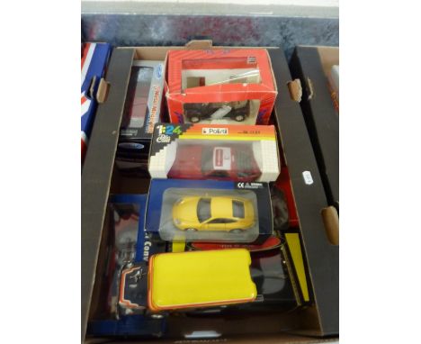 A COLLECTION OF TEN BOXED (ONE UNBOXED) 1:24 SCALE MODEL DIECAST CARS, manufacturers including, Burago, Tonka and Polistil. V