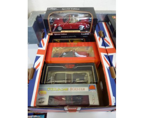 A COLLECTION OF FIVE BOXED 1:18 - 1:22 SCALE MODEL DIECAST CARS, manufacturers including, Burago and Maisto, various models