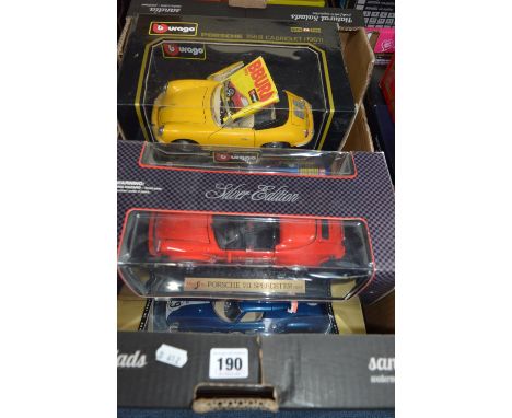 A COLLECTION OF FIVE BOXED 1:18 SCALE MODEL DIECAST CARS, manufactured by Burago, Maisto, Revell and Motormax.  Models are Eu