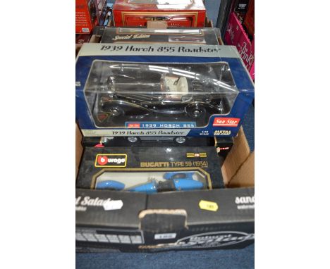 A COLLECTION OF FIVE BOXED 1:18 SCALE MODEL DIECAST CARS, manufactured by Burago, Maisto and Sunstar. Models are European car