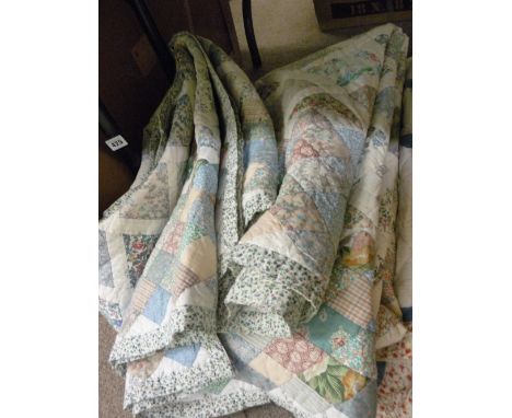 Two vintage style patchwork quilts/bed covers