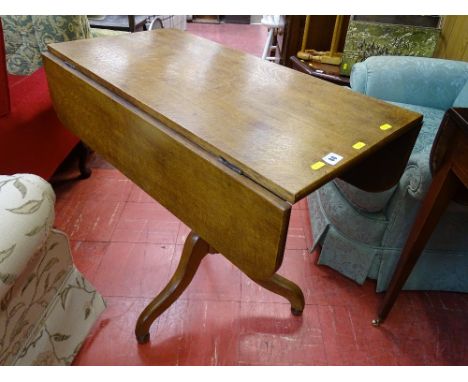 Antique oak twin flap pedestal table on tripod base