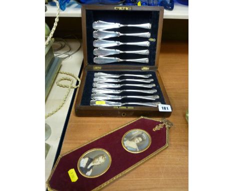 Cased quantity of pastry knives and a gilt metal framed pair of portrait miniatures