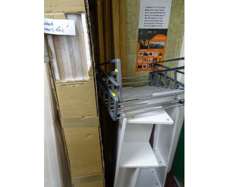 Boxed hardwood clothes rail, two melamine shelf units, two variable cupboard baskets and a quantity of pegged hanging rails (