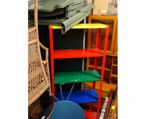 Metal multi-shelf, multi-coloured rack, a pair of folding plastic garden chairs and a metal circular folding table